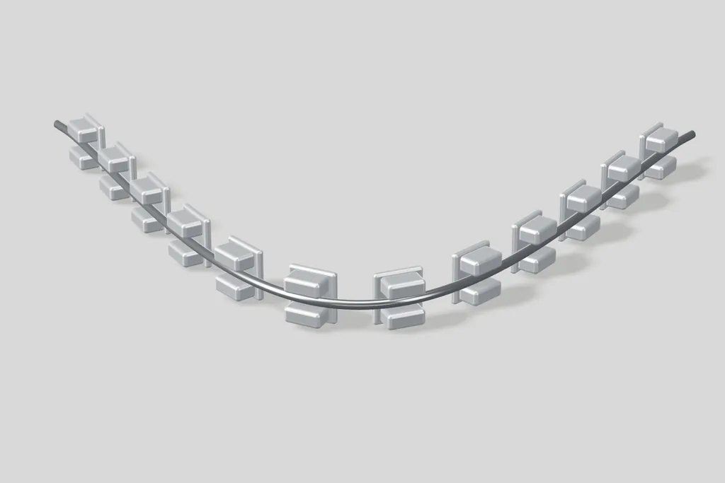 Arco de ortodoncia con brackets metálicos